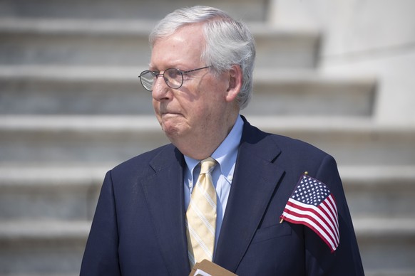 epa09466001 Senate Minority Leader Mitch McConnell attends a Congressional remembrance ceremony to mark the 20th anniversary of the terrorist attacks on 9/11, at the East Front steps of the US Capitol ...