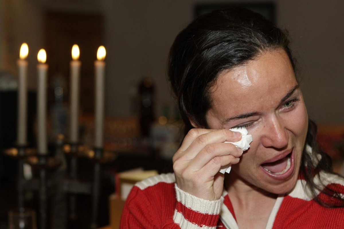 Catherine Borghi of Switzerland reacts after announcing her retirement, during a press conference, prior to the women's Alpine Ski World Cup in Crans-Montana, Switzerland, Thursday, March 6, 2008 ...