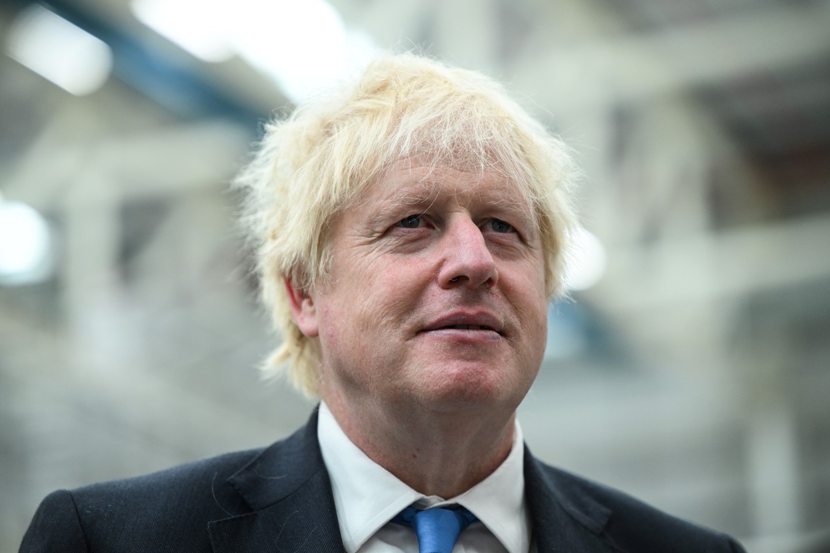 Britain's Prime Minister Boris Johnson during a visit to the Airbus UK East Factory in Broughton, North Wales, Friday, Aug. 12, 2022. (Oli Scarff/Pool Photo via AP)