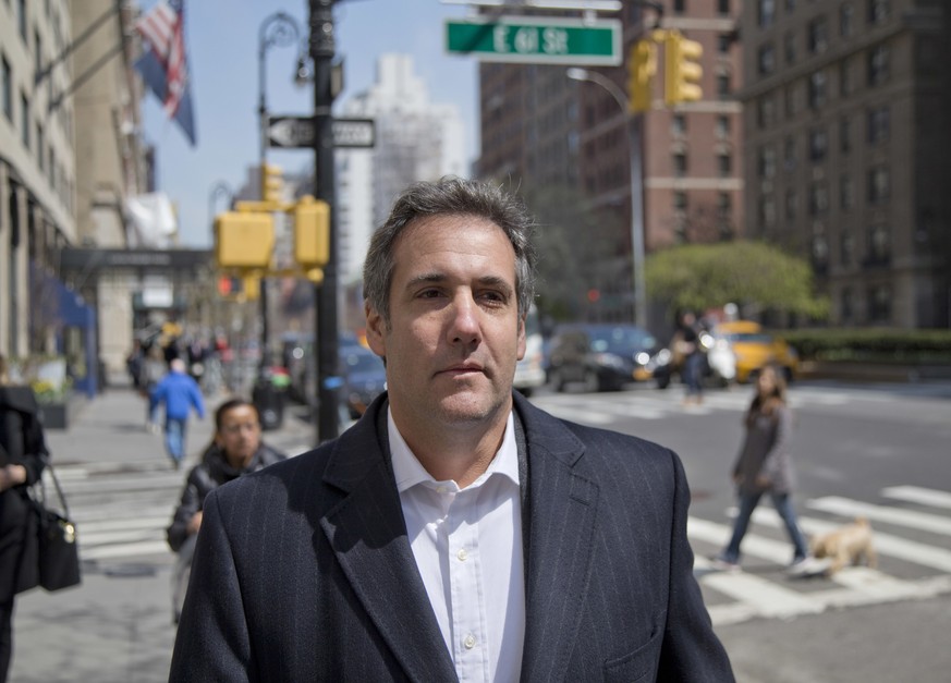 FILE - In this April 11, 2018, file photo, attorney Michael Cohen walks down the sidewalk in New York. Cohen, President Donald Trump&#039;s longtime personal lawyer who is under investigation by feder ...