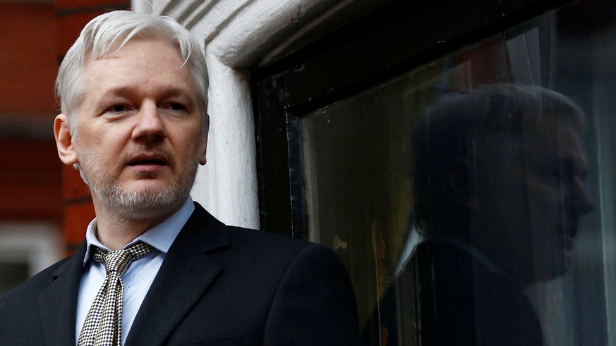 WikiLeaks founder Julian Assange makes a speech from the balcony of the Ecuadorian Embassy, in central London, Britain February 5, 2016. REUTERS/Peter Nicholls/File Photo