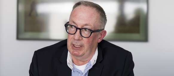 KEYPIX - Nicolas Feraud, Mayor of Crans-Montana, speaks to a journalist during an interview, in Crans-Montana, Switzerland, Monday, January 26, 2026. 40 people mostly teenagers lost their lives and 11 ...