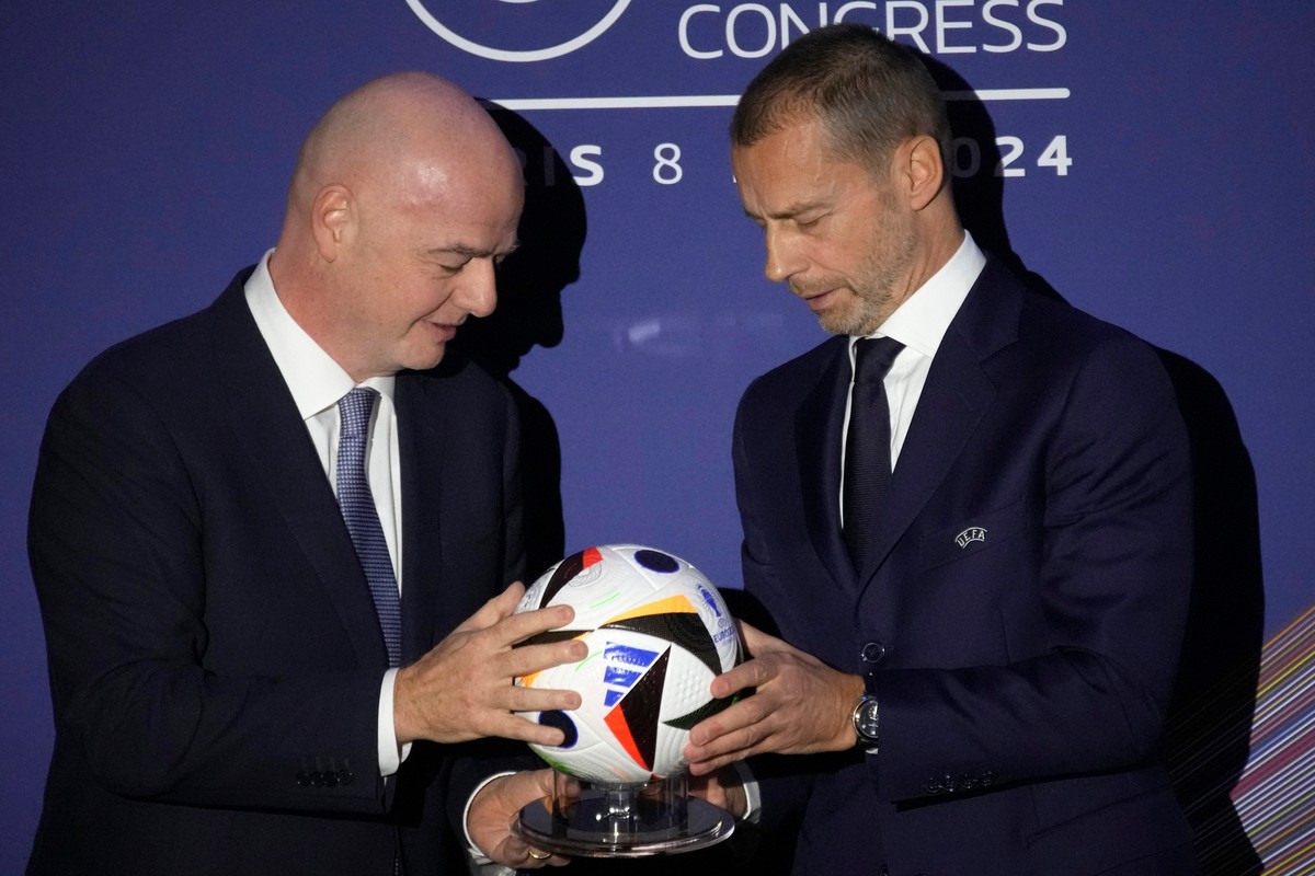 FILE - UEFA President Aleksander Ceferin, right, and FIFA President Gianni Infantino pose during the 48th UEFA congress in Paris, Thursday, Feb. 8, 2024. (AP Photo/Christophe Ena, File)
WCup FIFA Inve ...