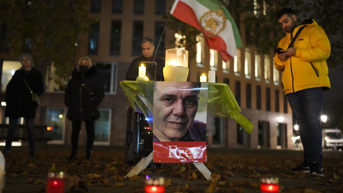People commemorate Iranian-German Jamshid Sharmahd during a protest following his execution in Iran, near the Foreign Ministry in Berlin, Germany, Monday, Oct. 28, 2024. (AP Photo/Markus Schreiber)