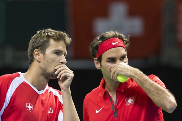 Genf, 19.09.2015, Tennis Davis Cup, Schweiz - Holland, Marco Chiudinelli (L) und Roger Federer (SUI, R) (Pascal Muller/EQ Images)