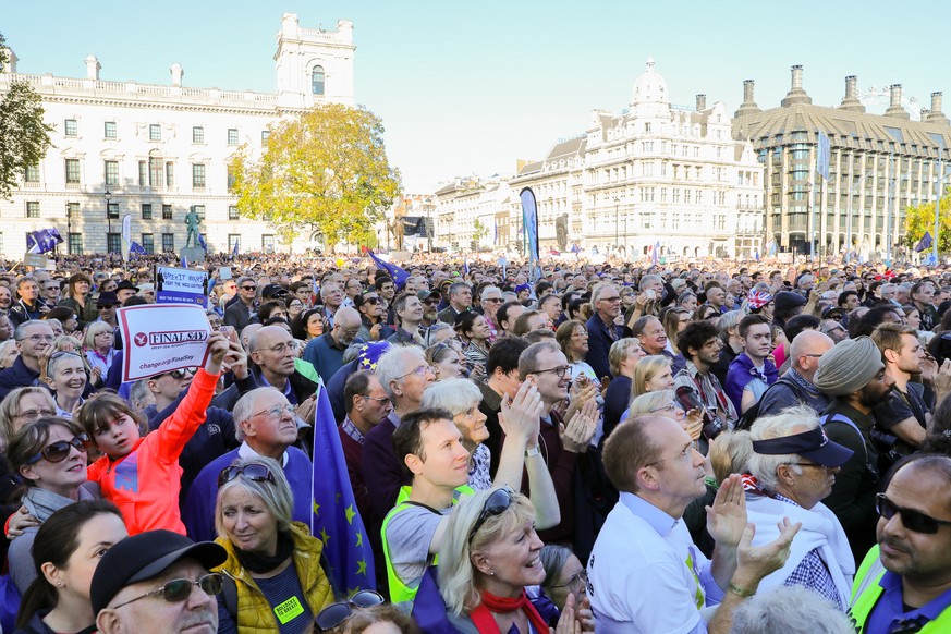 epa07107213 Tens of thousands of demonstrators gather in Parliament Square during the People&#039;s Vote March for the Future in London, Britain, 20 October 2018. Reports state that the &#039;March fo ...