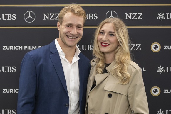 Swiss ski racer Marco Odermatt and Stella Parpan pose on the Green Carpet before the screening of the movie &quot;Aiming High - A Race Against the Limits&quot; at the 20th Zurich Film Festival (ZFF),  ...