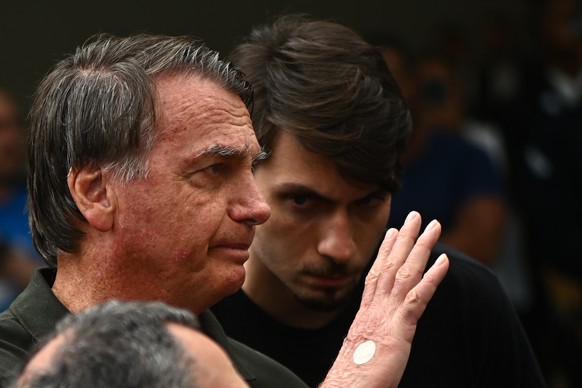 epa12377404 Brazilian former President Jair Bolsonaro leaves the DF Star Hospital in Brasilia, Brazil, 14 September 2025. Bolsonaro returned to house arrest at his residence in Brasilia hours after be ...