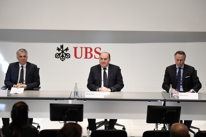 Sergio Ermotti, left, CEO of Swiss Bank UBS, Axel A. Weber, Center, Chairman of the Board of Directors of UBS and .Ralph Hamers, right, new CEO of Swiss Bank UBS, during a press conference in Zurich,  ...