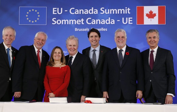 epa05610185 (L-R) Canada&#039;s Foreign Minister Stephane Dion, Quebec&#039;s former Premier Pierre- Marc Johnson, Canada&#039;s International Trade Minister Chrystia Freeland, Quebec&#039;s former Pr ...