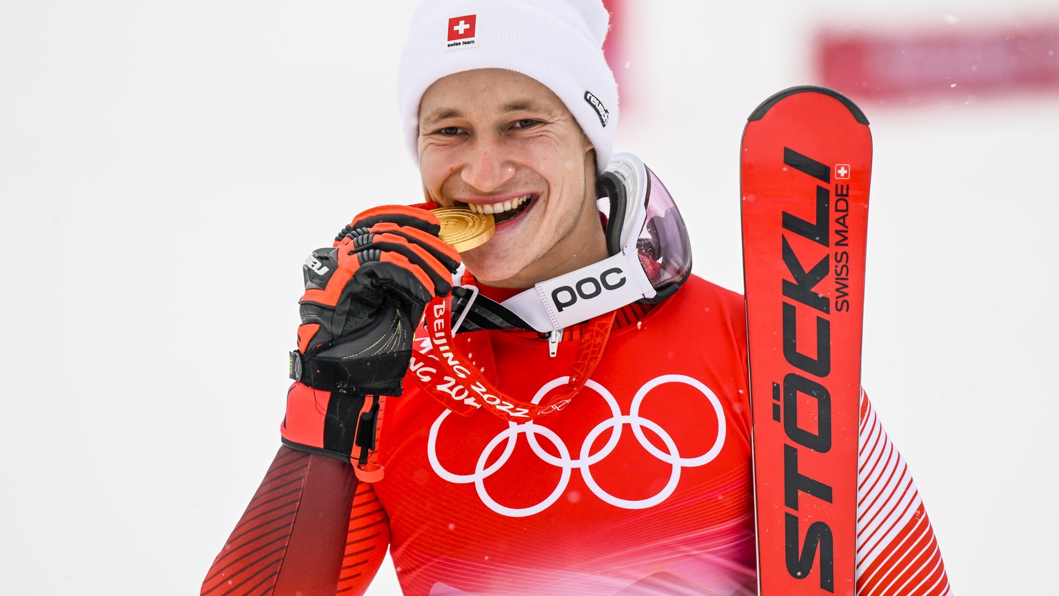 Gold medalist Marco Odermatt of Switzerland celebrates during the victory ceremony of the men&#039;s Alpine Skiing giant slalom race at the 2022 Olympic Winter Games in Yanqing, China, on Sunday, Febr ...