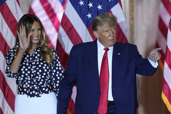 Former President Donald Trump takes the stage with former first lady Melania Trump after announcing a third presidential nomination at Mar-a-Lago in Palm Beach, Florida, Tuesday, Nov. 15, 2022. (AP Photo/Rebec...
