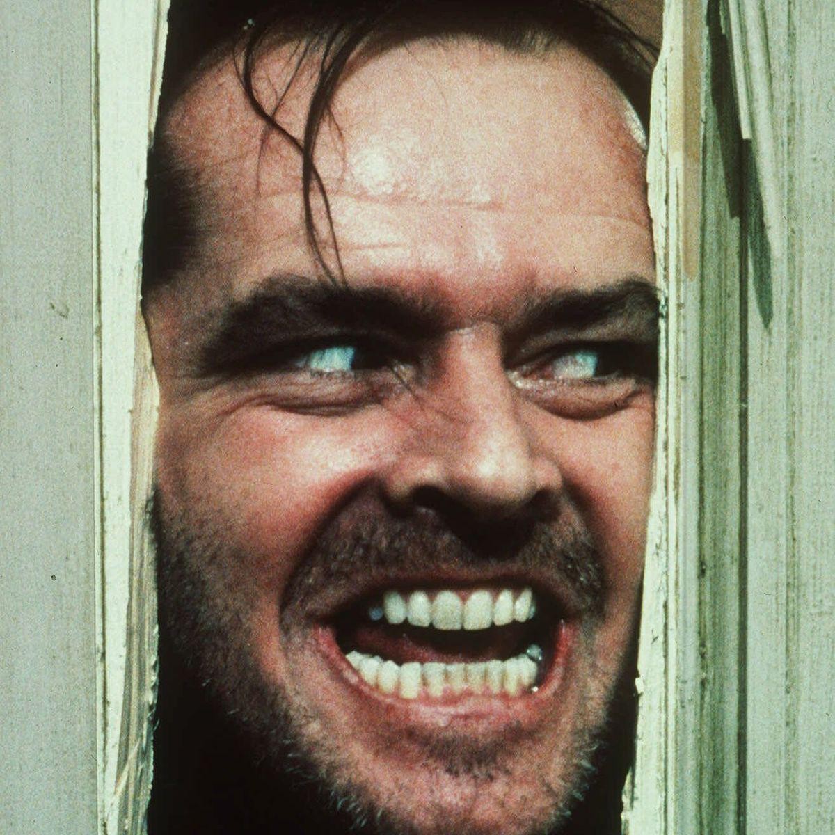 FILE- In this file image courtesy of Warner Bros. Inc., actor Jack Nicholson, portraying "Jack Torrance" in the movie "The Shining" directed by Stanley Kubrick, peers through a hol ...