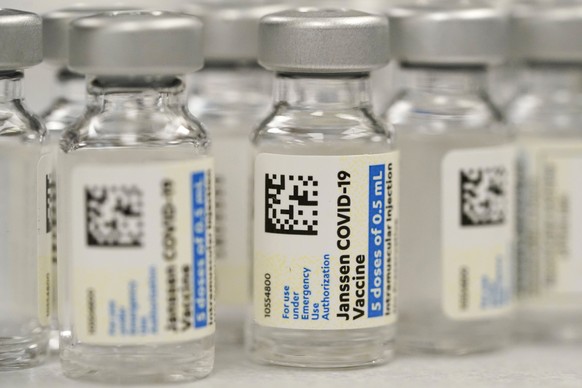 FILE - This Saturday, March 6, 2021, file photo shows vials of Johnson &amp; Johnson COVID-19 vaccine at a pharmacy in Denver. Johnson &amp; Johnson has asked U.S. regulators to allow booster shots of ...