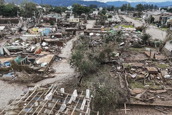 epa11329822 A photo taken with a drone shows the destruction following floods after the overflowing of the Forqueta River in Lajeado, Brasil, 09 May 2024. At least 108 people died and more than 130 we ...