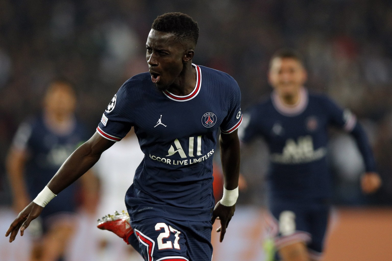 epa09494076 Paris Saint Germain?s Idrissa Gana Gueye celebrates a goal during the UEFA Champions League group A soccer match between PSG and Manchester City at the Parc des Princes stadium in Paris, F ...