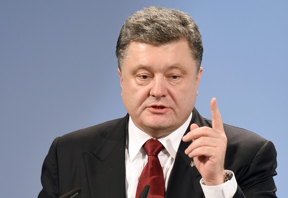 epa04607662 Ukrainian President Petro Poroschenko speaks during the 51st Security Conference in Munich, Germany, 07 February 2015. Dozens of heads of state and government, Defense and Foreign Minister ...