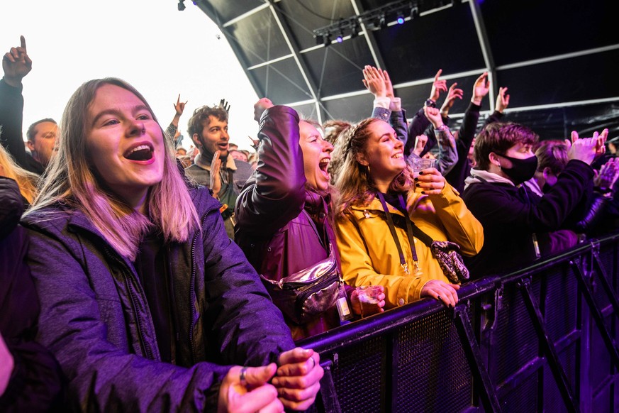 epa09087789 Visitors of a pop festival Back To Live on the event grounds of Walibi Holland during a performance by Froukje (Froukje Veenstra), in Biddinghuizen, the Netherlands, 21 March 2021. The eve ...