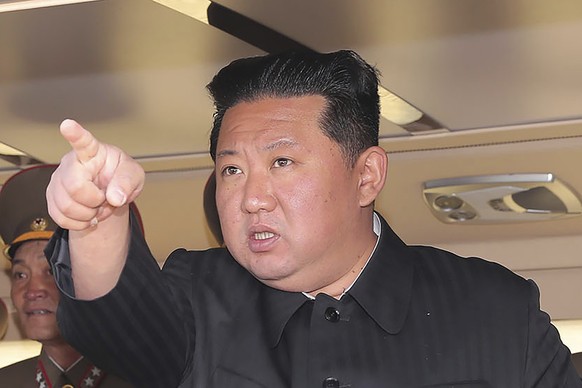 FILE - This undated photo provided on April 17, 2022, by the North Korean government shows Kim Jong Un at an undisclosed location in North Korea. The Korean Central News Agency said Thursday, May 12,  ...