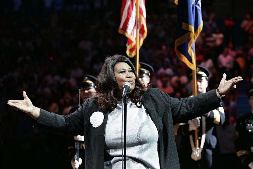 epa06952656 (FILE) - US recording artist Aretha Franklin sings the National Anthem before the start of the NBA Finals game five between the LA Lakers and the Detroit Pistons at The Palace of Auburn Hi ...