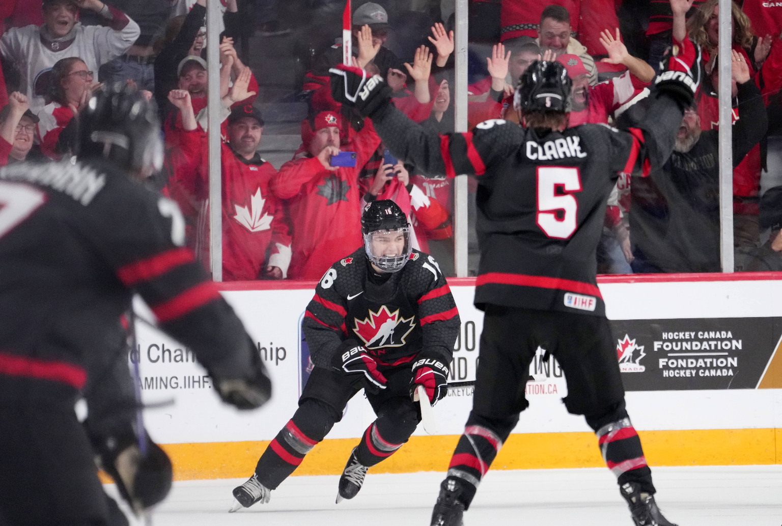 January 2, 2023, Halifax, NS, Canada: Canada s Connor Bedard, centre, reacts after scoring the game-winning goal in overtime of IIHF World Junior Hockey Championship quarterfinal action against Slovak ...