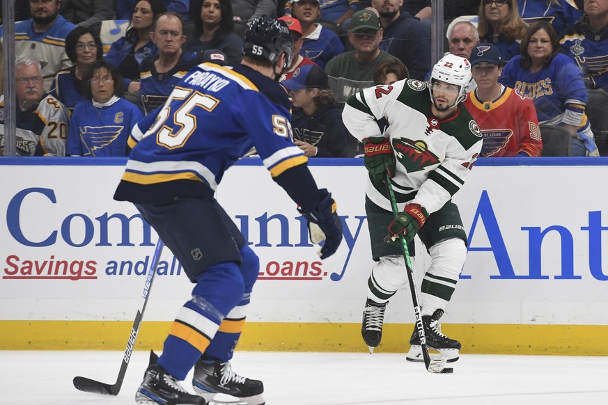 Minnesota Wild&#039;s Kevin Fiala (22) is defended by St. Louis Blues&#039; Colton Parayko (55) during the first period in Game 3 of an NHL hockey Stanley Cup first-round playoff series Friday, May 6, ...