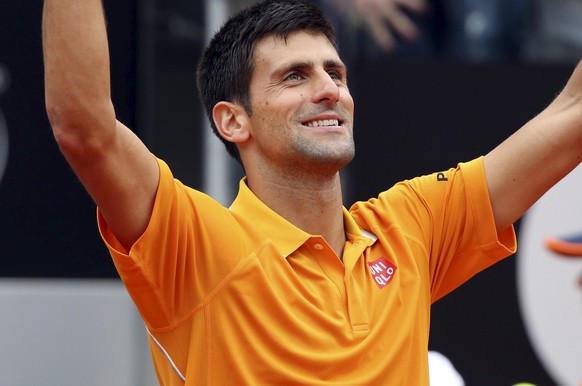 Novak Djokovic of Serbia celebrates after winning his semifinal match against David Ferrer of Spain at the Rome Open tennis tournament in Rome, Italy, May 16, 2015. REUTERS/Stefano Rellandini