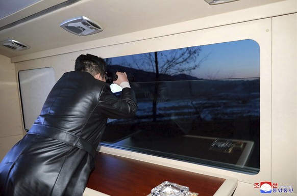 This photo provided by the North Korean government shows North Korean leader Kim Jong Un watches what it says a test launch of a hypersonic missile on Jan. 11, 2022 in North Korea. Independent journal ...