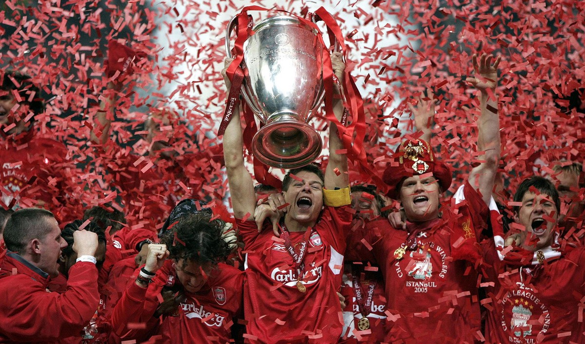 Liverpool's captain Steven Gerrard, center, lifts the Champions League trophy at The Ataturk Olympic Stadium, Istanbul, Turkey, Wednesday May 25, 2005. Liverpool won the Champions League final be ...