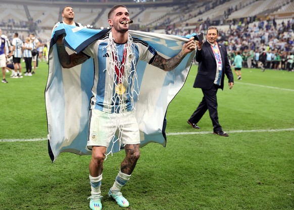 epa10373088 Rodrigo De Paul of Argentina celebrates after winning the FIFA World Cup 2022 Final between Argentina and France at Lusail stadium, Lusail, Qatar, 18 December 2022. EPA/Tolga Bozoglu