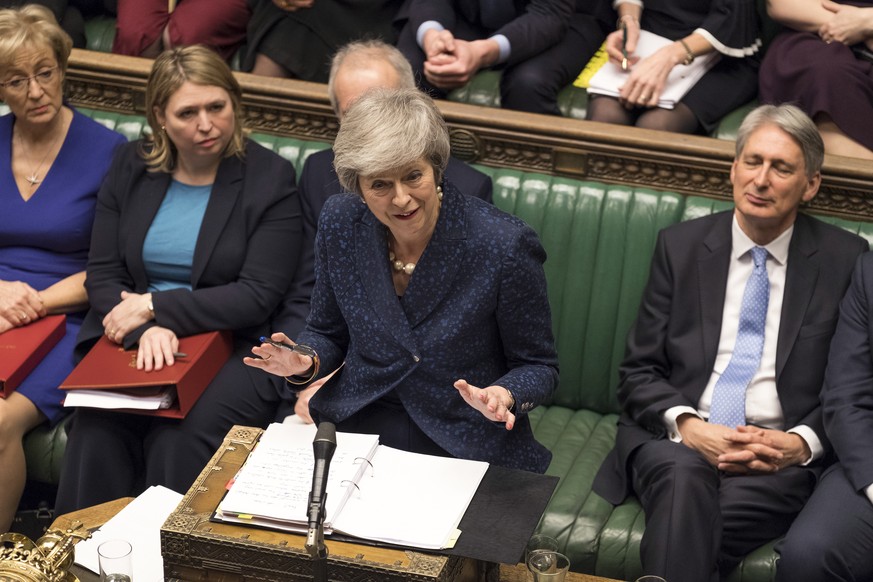 Britain's Prime Minister Theresa May speaks during the regular scheduled Prime Minister's Questions inside the House of Commons in London, Wednesday Dec. 12, 2018. May has confirmed there will be a vo ...