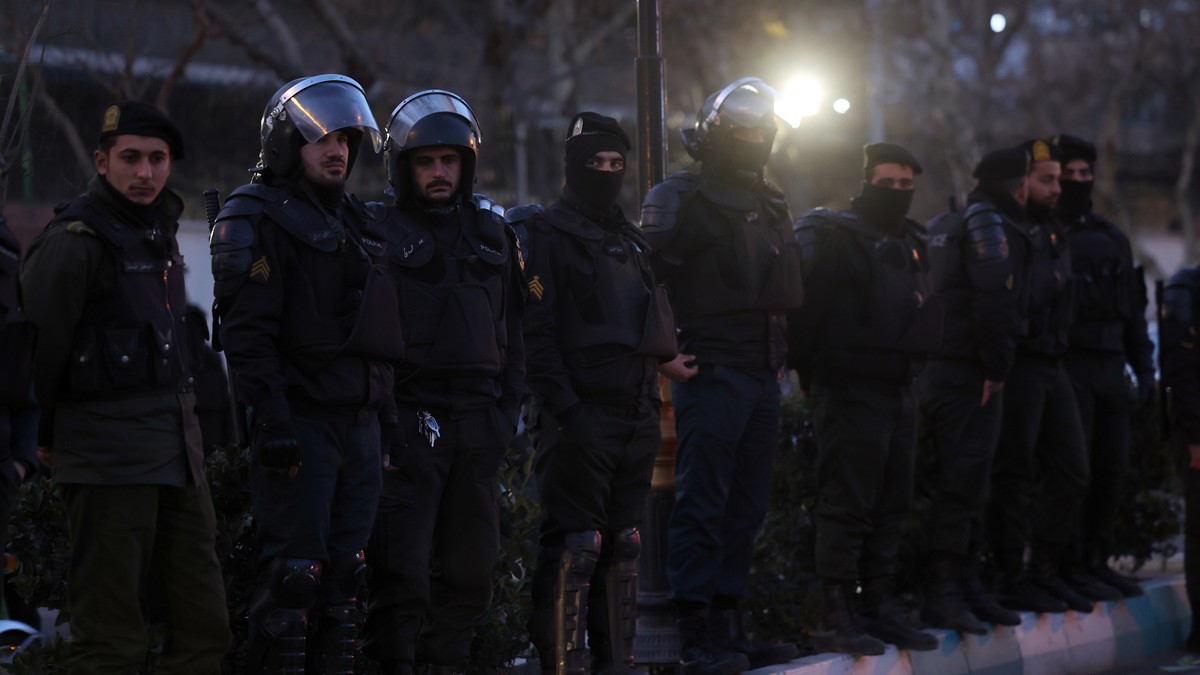 epa12649006 Iranian riot police stand guard as students protest in front of the British embassy in Tehran, Iran, 14 January 2026. Iran is experiencing a nationwide internet blackout that began on 08 J ...
