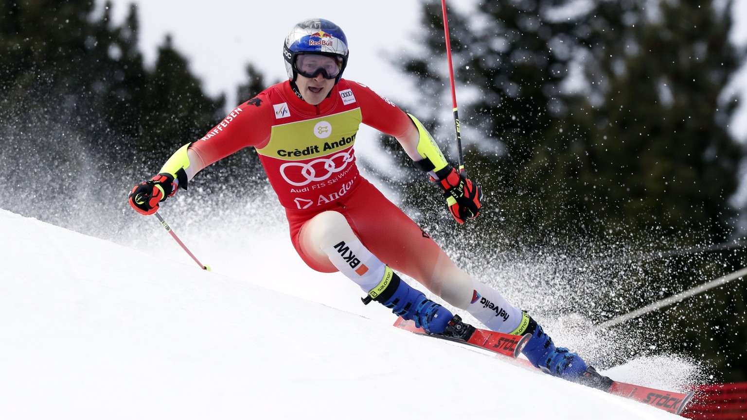 epa10529528 Marco Odermatt of Switzerland in action during the 1st run of the Men&#039;s Giant Slalom race at the FIS Alpine Skiing World Cup finals in the skiing resort of El Tarter, Andorra, 18 Marc ...