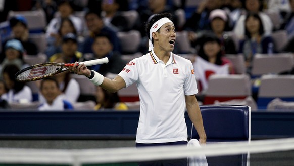 Kei Nishikori of Japan talks to the umpire during his match against Wu Yibing of China in their men&#039;s singles match in the Shanghai Masters tennis tournament at Qizhong Forest Sports City Tennis  ...