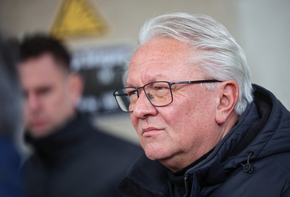 epa12674760 Armin Papperger, Chairman of the Executive Board of the Rheinmetall defence group, attends a factory tour at the Rheinmetall Waffe Munition GmbH, Pyrotechnics Division Silberhuette, in Har ...