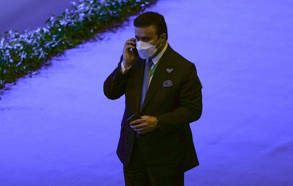 Inspector general at the United Arab Emirates interior ministry Maj. Gen. Ahmed Naser al-Raisi speaks on his cell phone during the first day of the Interpol annual assembly in Istanbul, Turkey, Tuesda ...