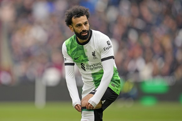 Liverpool&#039;s Mohamed Salah looks on during the English Premier League soccer match between West Ham United and Liverpool at London stadium in London, Saturday, April 27, 2024. (AP Photo/Kin Cheung ...