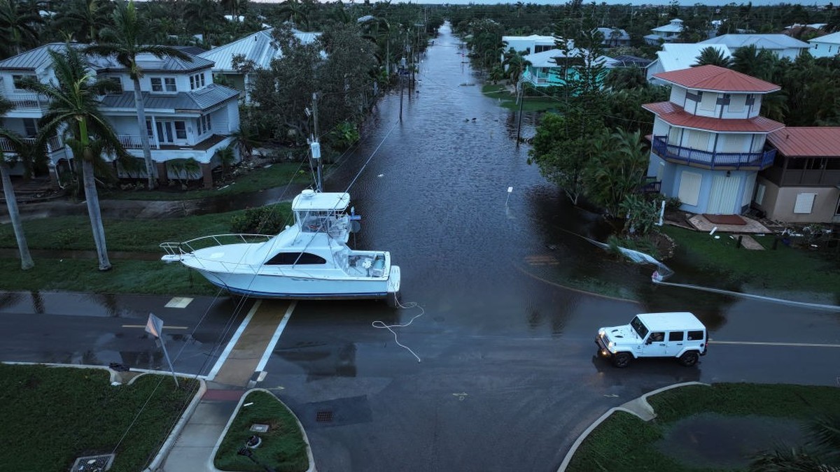PUNTA GORDA - OCTOBER 10: In this aerial view, a boat rests in a street after it was washed ashore when Hurricane Milton passed through the area on October 10, 2024, in Punta Gorda, Florida. The storm ...