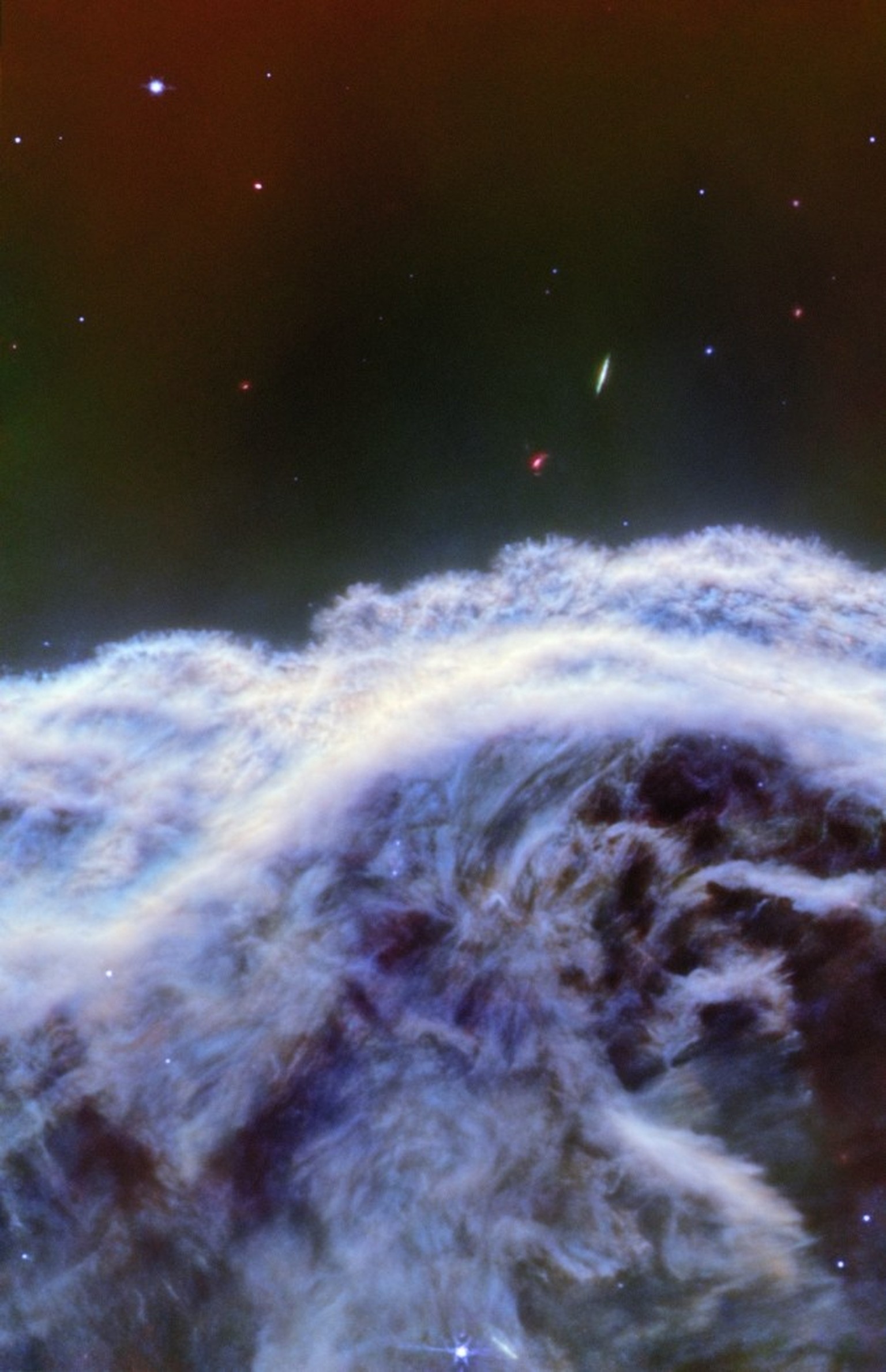 El telescopio espacial James Webb de la NASA, la ESA y la CSA ha capturado las imágenes infrarrojas más nítidas hasta el momento de uno de los objetos más distintivos de nuestro cielo, la Nebulosa Cabeza de Caballo.  Estas notas aparecen a un lado...