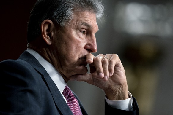 Sen. Joe Manchin, D-W.Va., pauses during a Senate Armed Services Committee hearing, Tuesday, Sept. 28, 2021, on Capitol Hill in Washington. (Stefani Reynolds/The New York Times via AP, Pool)