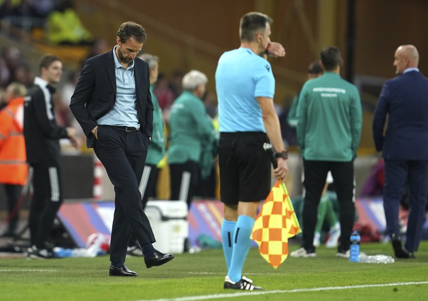 England&#039;s coach Gareth Southgate, left, reacts at the end of the UEFA Nations League soccer match between England and Hungary at the Molineux stadium in Wolverhampton, England, Tuesday, June 14,  ...