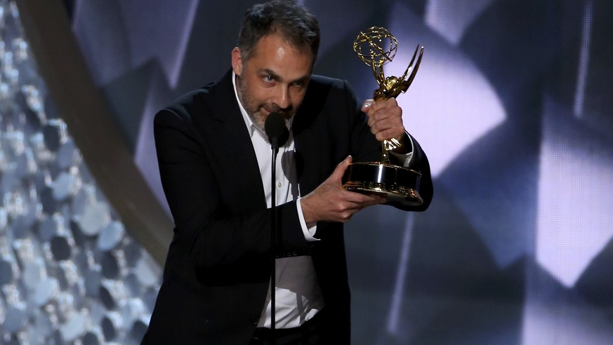 Miguel Sapochnik accepts the award for Outstanding Directing For A Drama Series for &quot;Game Of Thrones&quot; at the 68th Primetime Emmy Awards in Los Angeles, California, U.S., September 18, 2016.  ...