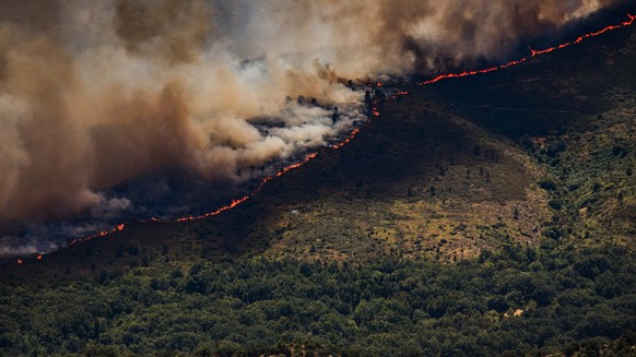 A wall of flames advances as a wildfire burns near Burgohondo, in Ávila province, Spain, Thursday, July 23, 2026. (Mateo Lanzuela/Europa Press via AP)
Spain Wildfires