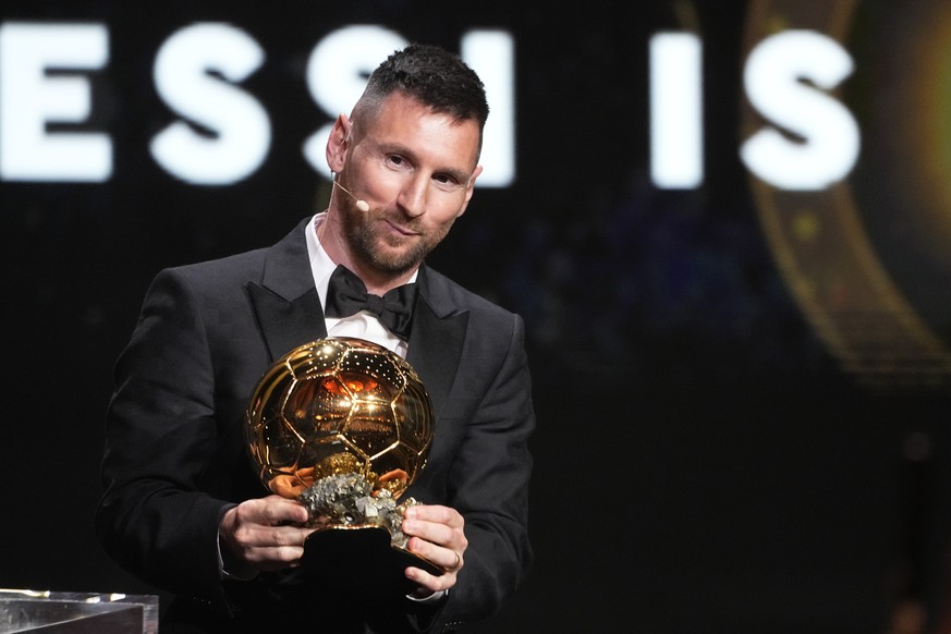 Inter Miami's and Argentina's national team player Lionel Messi receives the 2023 Ballon d'Or trophy during the 67th Ballon d'Or (Golden Ball) award ceremony at Theatre du Chatelet ...
