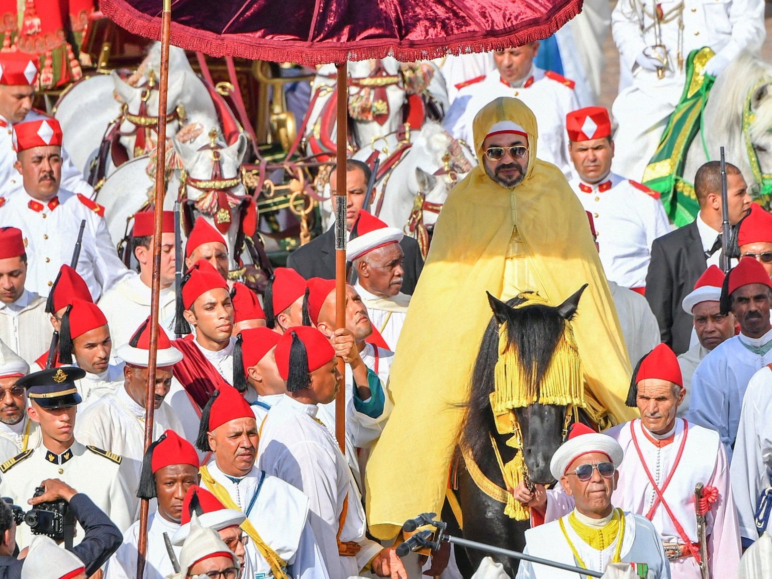 20th Anniversary Of Accession Of King Mohamed VI Handout - King Mohammed VI of Morocco accompanied by Crown Prince Moulay El Hassan attends the ceremony of the 20th anniversary of the sovereign s acce ...