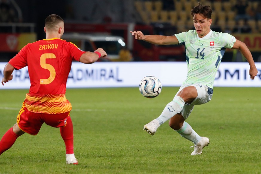 Switzerland's Ardon Jashari controls the ball in front of North Macedonia's Gjoko Zajkov during the UEFA Nations League soccer match between North Macedonia and Switzerland in Skopje, North  ...