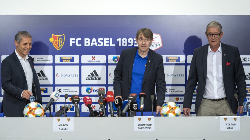 Cheftrainer Marcel Koller, Praesident Bernhard Burgener und CEO Roland Heri, von links, an einer Medienkonferenz des FC Basel 1893 in Basel, am Dienstag, 18. Juni 2019. (KEYSTONE/Georgios Kefalas)