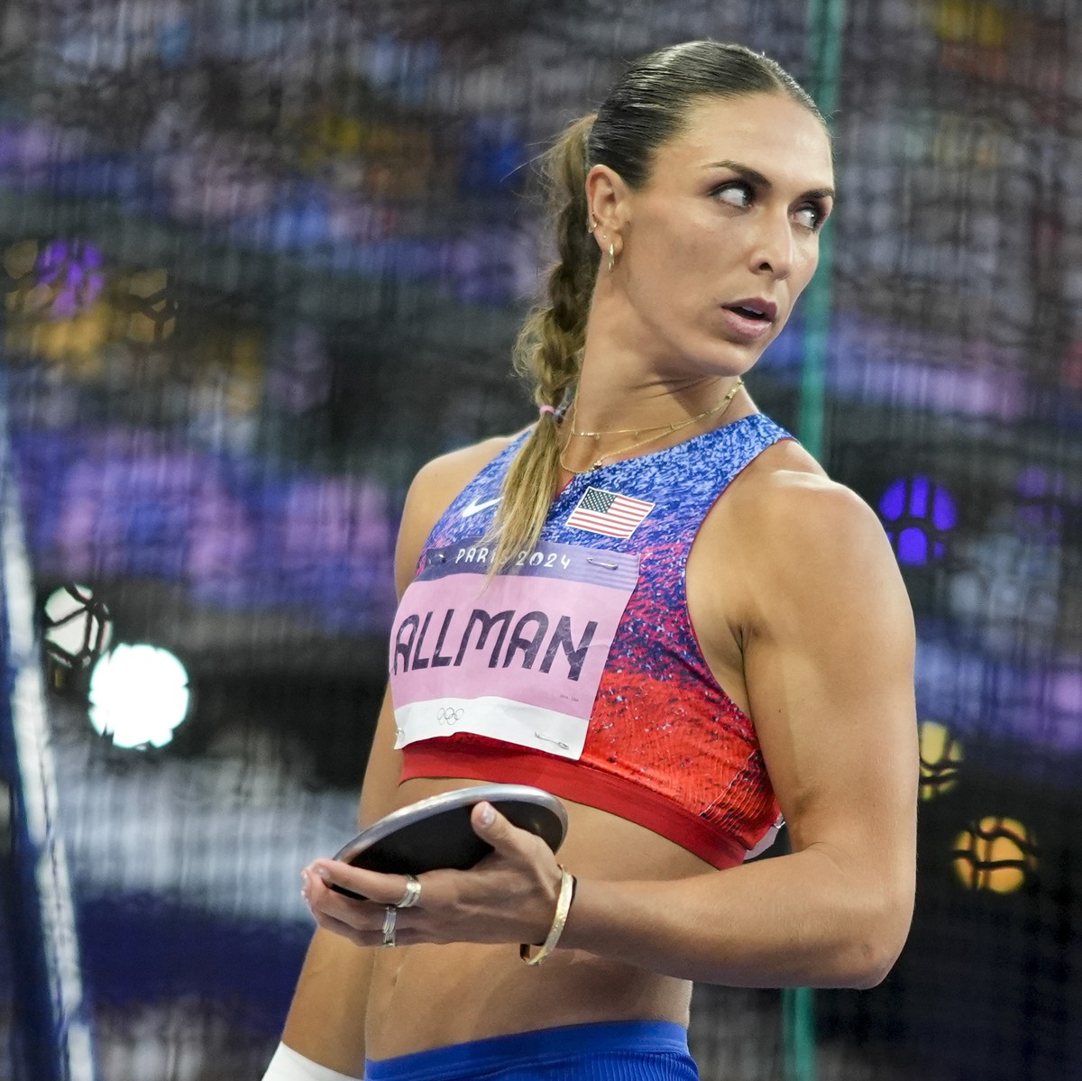 Valarie Allman of the United States, watches during the women's discus throw final at the 2024 Summer Olympics, Monday, Aug. 5, 2024, in Saint-Denis, France. (AP Photo/Matthias Schrader)