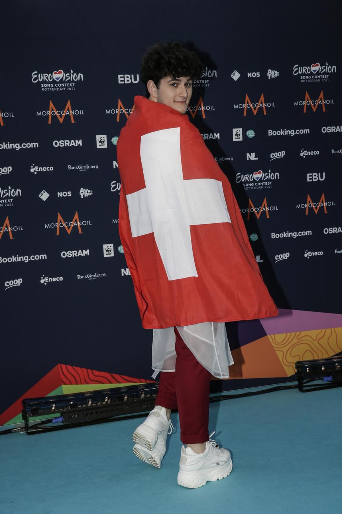 Gjon's Tears from Switzerland poses for photographers upon arrival at the Turquoise Carpet event of the Eurovision Song Contest in Rotterdam, Netherlands, Sunday, May 16, 2021. (AP Photo/Peter De ...