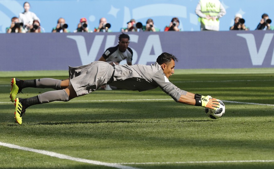 Costa Rica goalkeeper Keylor Navas makes a save during the group E match between Brazil and Costa Rica at the 2018 soccer World Cup in the St. Petersburg Stadium in St. Petersburg, Russia, Friday, Jun ...